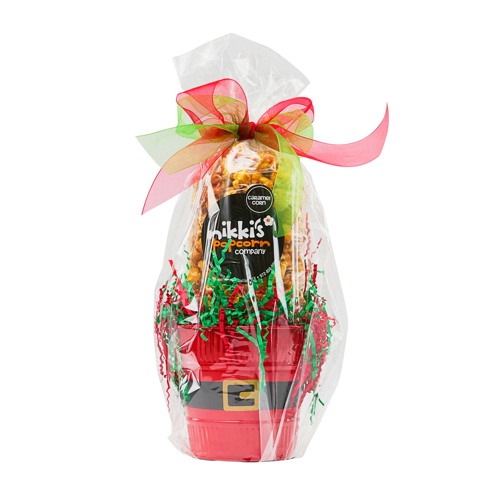 Gift set with popcorn bucket and bag of popcorn, tied with a colorful bow on a white background.